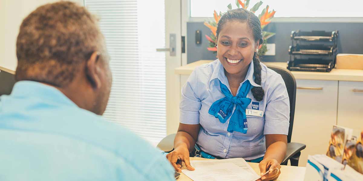 bred bank solomon staff helping a customer